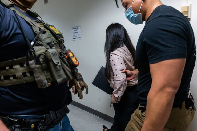 federal-agents-detain-woman-immigration-court.jpg