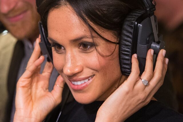 meghan-markle-listens-radio.jpg