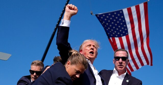 trump-assassination-fist-flag-AP-640x335.jpg