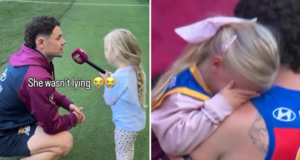 Piper, la hija de Lachie Neale, lo acompaña en el MCG